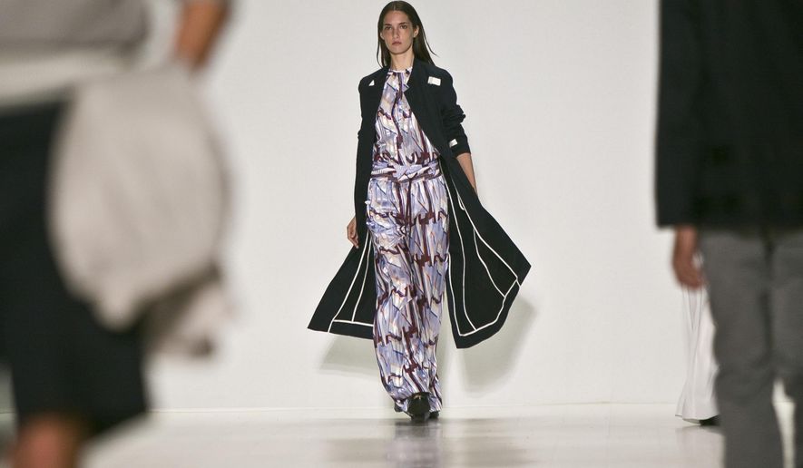 Fashion from the Richard Chai Spring 2015 collection is modeled during Fashion Week on Thursday, Sept. 4, 2014 in New York. (AP Photo/Bebeto Matthews)