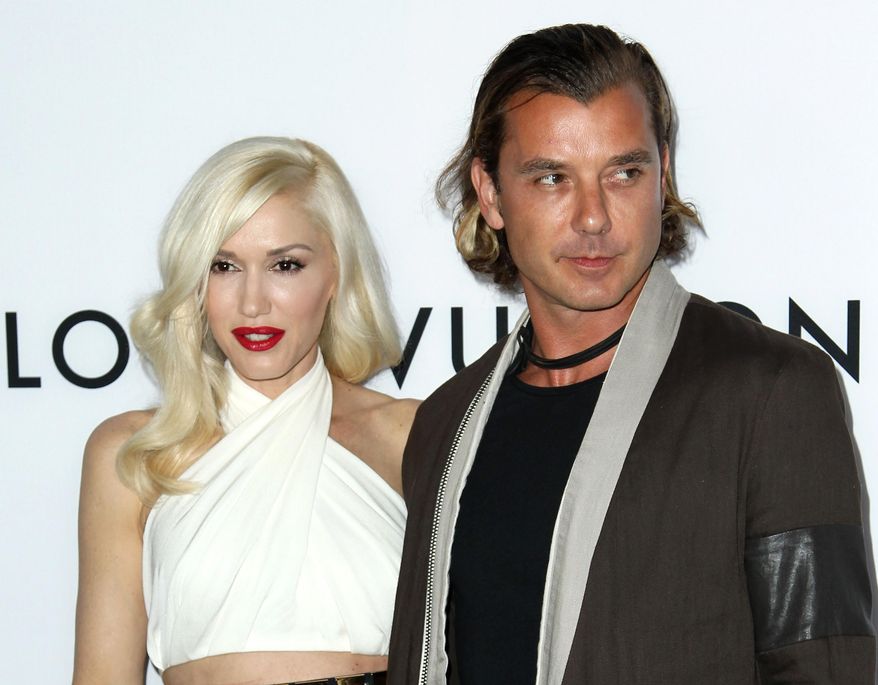 FILE - In this June 4, 2013 file photo, Gavin Rossdale, right, and Gwen Stefani arrive at the LA premiere of "The Bling Ring" in Los Angeles. Stefani is a panelist on the singing competition series, "The Voice." Rossdale was the "coach" brought in to give advice to members of Stefani's team of aspiring singers, which starts its new season on Sept. 22. Rossdale was the lead singer of the British rock band Bush. (Photo by Matt Sayles/Invision/AP, File)