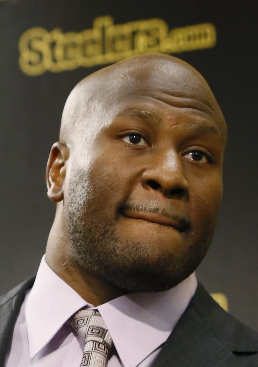 Former Pittsburgh Steelers linebacker James Harrison talks to reporters at a news conference where he talks about his retiring from football on Friday, Sept. 5, 2014 in Pittsburgh. Harrison, known for his hard hitting and a 100-yard interception return for a touchdown in Super Bowl XLIII, officially announced his retirement after 11 years in the NFL. (AP Photo/Keith Srakocic)