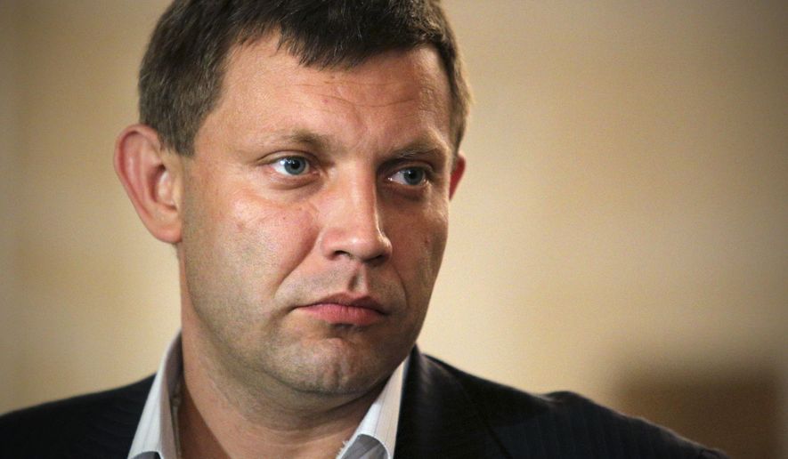 Alexander Zakharchenko, the leader of pro-Russian rebels in Donetsk, meets with the media after talks on cease-fire in Ukraine in Minsk, Belarus, Friday, Sept. 5, 2014. Ukraine and the Russian-backed rebels have signed a cease-fire deal that starts in less than two hours, a European official at the talks said Friday. (AP Photo)