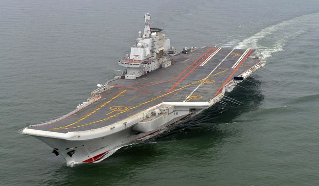 In this May 2012 photo provided by China&#x27;s Xinhua News Agency, Chinese aircraft carrier Liaoning cruises for a test on the sea. (Associated Press/Xinhua, Li Tang) **FILE**