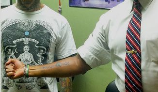 ** Former Florida congressman Allen West shows off his &quot;“Molon Labe” tattoo. The phrase it Greek for &quot;Come and take it.&quot; (Image: Instagram, Aces High Tattoo Shop)