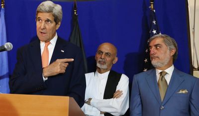 FILE - In this  Friday, Aug. 8, 2014 file photo, U.S. Secretary of State John Kerry, left, speaks as Afghan presidential candidates Ashraf Ghani Ahmadzai, center, and Abdullah Abdullah listen during a joint press conference in Kabul, Afghanistan. &quot;Radicals&quot; backing Abdullah could foment postelection violence if he isn&#39;t given an equitable share of power, his spokesman warned Saturday, Sept. 6, 2014 ahead of a meeting with his rival aimed at resolving a monthslong election dispute. U.S. Secretary of State John Kerry helped broker an agreement this summer under which all 8 million ballots would be recounted, a process which was concluded Friday. (AP Photo/Rahmat Gul, File)
