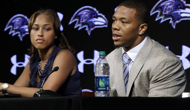 FILE - In this May 23, 2014, file photo, Baltimore Ravens running back Ray Rice, right, speaks alongside his wife, Janay, during a news conference at the team&#x27;s practice facility in Owings Mills, Md. A new video that appears to show Ray Rice striking then-fiance Janay Palmer in an elevator last February has been released on a website. (AP Photo/Patrick Semansky, File)