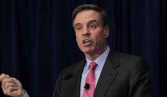 Sen. Mark Warner, D-Va. speaks during a town hall forum in Reston, Va, Monday, Sept 8. 2014. Warner and his Republican opponent Ed Gillespie made their pitches to northern Virginia&#x27;s tech community at the town hall forum. The Northern Virginia Technology Council hosted the town hall forum. (AP Photo/Luis M. Alvarez)