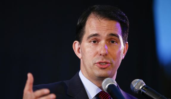 Wisconsin Gov. Scott Walker addresses the Republican National Committee summer meetings in Chicago on Aug. 8, 2014. (Associated Press) **FILE**