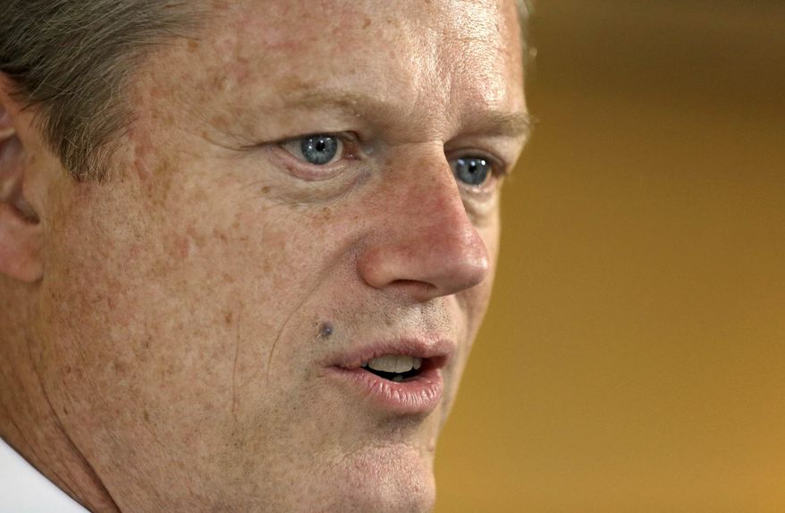 Massachusetts Republican gubernatorial hopeful Charlie Baker speaks with reporters at his campaign headquarters, Monday, Sept. 8, 2014, in Boston. Baker is seeking his party's nomination in the Sept. 9 primary. (AP Photo/Steven Senne)