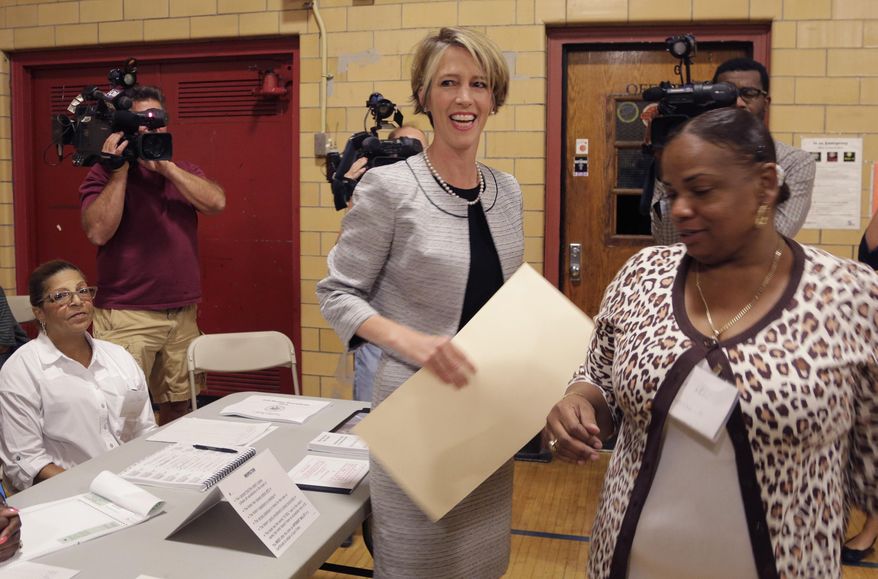 Zephyr Teachout, a Democratic gubernatorial candidate, votes in the primary election, Tuesday, Sept. 9, 2014 in the Brooklyn borough of New York. Teachout is challenging Gov. Andrew Cuomo as he seeks a second term in office. (AP Photo/Mark Lennihan)