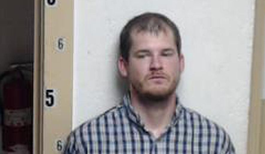 This Sunday, Sept. 6, 2014, photo made available by the Smith County Sheriff's Office shows Timothy Ray Jones Jr. On Tuesday, Sept. 9, 2014, authorities said the father of five children whose bodies were found in Alabama has been charged with child neglect and that other charges are pending. (AP Photo/Smith County Sheriff's Office)