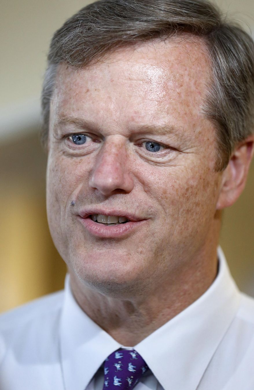 Massachusetts Republican gubernatorial hopeful Charlie Baker speaks with reporters at his campaign headquarters, Monday, Sept. 8, 2014, in Boston. Baker is seeking his party's nomination in the Sept. 9 primary. (AP Photo/Steven Senne)