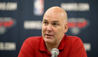FILE - In this July 10, 2013, file photo, Atlanta Hawks general manager Danny Ferry speaks at a press conference in Atlanta. Ferry has been disciplined by CEO Steve Koonin for making racially charged comments about Luol Deng when the team pursued the free agent this year. Ferry apologized Tuesday, Sept. 9, 2014,  for &amp;#8220;repeating comments that were gathered from numerous sources&amp;#8221; about Deng. (AP Photo/David Goldman, File)