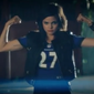 A model wears a Ray Rice jersey in a 2013 NFL commercial for women&#39;s apparel. (Screengrab from baltimoreravens.com)