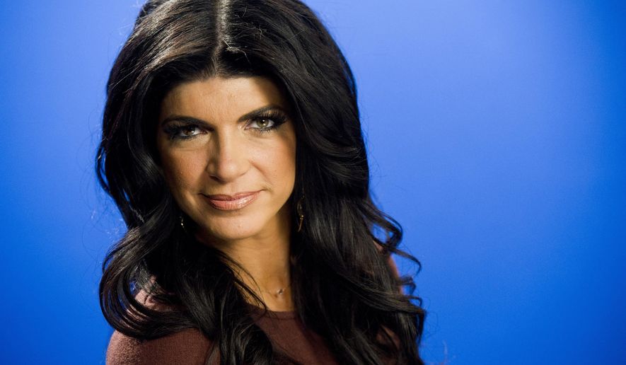 In this Jan. 4, 2012 photo, Teresa Giudice poses for a portrait in New York. Giudice and her husband, Joe, are seeking nearly $4 million for their six-bedroom home in Montville, N.J. The couple are facing federal prison after they pleaded guilty to conspiracy to commit mail and wire fraud and three types of bankruptcy fraud. The stone and stucco home was built in 2008 on a nearly 4-acre lot that includes a stream and a pond. (AP Photo/Charles Sykes)