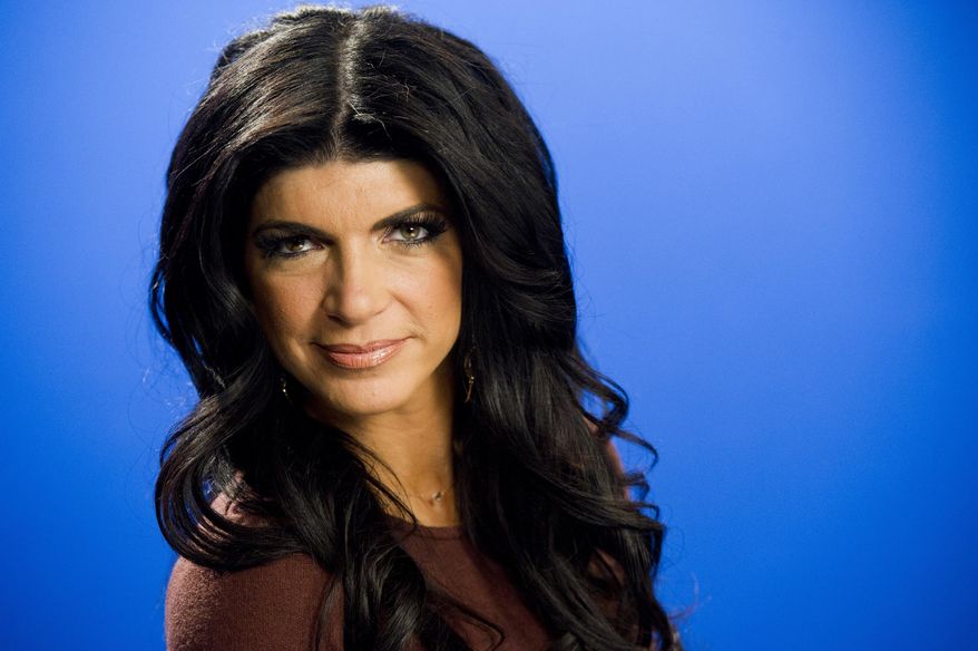 In this Jan. 4, 2012 photo, Teresa Giudice poses for a portrait in New York. Giudice and her husband, Joe, are seeking nearly $4 million for their six-bedroom home in Montville, N.J. The couple are facing federal prison after they pleaded guilty to conspiracy to commit mail and wire fraud and three types of bankruptcy fraud. The stone and stucco home was built in 2008 on a nearly 4-acre lot that includes a stream and a pond. (AP Photo/Charles Sykes)