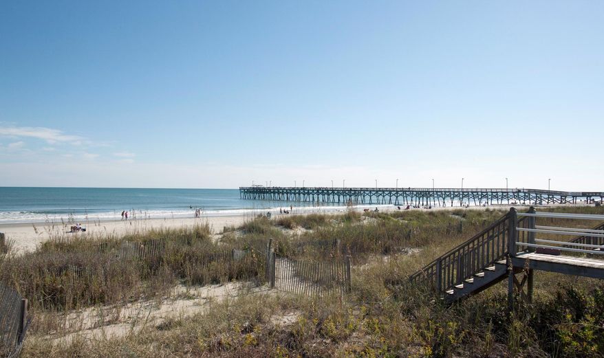 Myrtle Beach has launched a campaign to promote fall tourism called “The Secret’s Out: 60 More Days of Summer” to highlight the beach as a September-October destination. It’s one of a number of places around the country where fall tourism has increased, as travelers who are not tied to the school system take advantage of nice weather, fewer crowds and lower prices. (AP Photo/VisitMyrtleBeach.com)