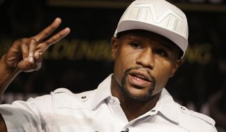 Boxer Floyd Mayweather Jr. speaks during a news conference Wednesday, Sept. 10, 2014, in Las Vegas. Mayweather Jr. is scheduled to fight Marcos Maidana in a welterweight title fight Saturday in Las Vegas. (AP Photo/John Locher)