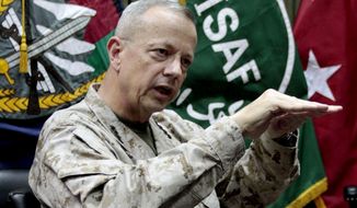 Gen. John Allen gestures during an interview with the Associated Press in Kabul, Afghanistan, in this July 22, 2012, file photo. (AP Photo/Musadeq Sadeq, File)