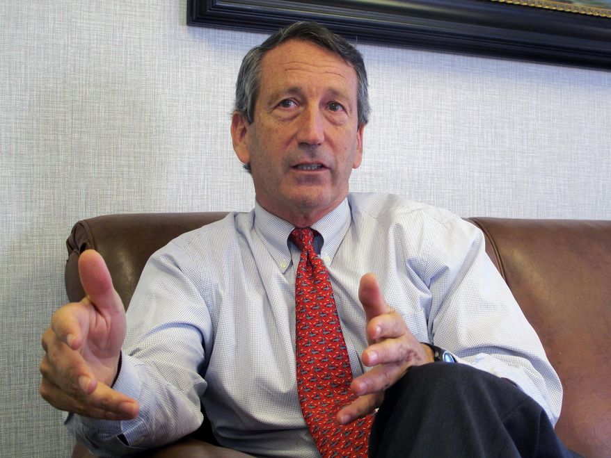 U.S. Rep. Mark Sanford, R-S.C., discusses his first months back in Congress during an Associated Press interview in his district office in Mount Pleasant, S.C., in this  Dec. 18, 2013, file photo. Sanford said on Friday, Sept. 12, 2014, that he and his fiancee are calling off their engagement due to the ongoing contention with his ex-wife Jenny Sanford, four years after their divorce. (AP Photo/Bruce Smith, File)
