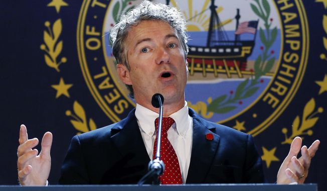 Sen. Rand Paul, Kentucky Republican, endorses Senate hopeful Scott Brown during a campaign event at the University of New Hampshire in Durham, N.H., on Sept. 12. (Associated Press)