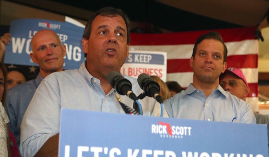 New Jersey Gov. Chris Christie speaks at a support rally for Florida Gov. Rick Scott  on Friday, Sept. 12 in Panama City Beach, Fla. Christie is helping Scott campaign in his  tight race with Republican-turned-Democrat former Gov. Charlie Crist. (AP Photo/News Herald, Patti Blake) MANDATORY CREDIT