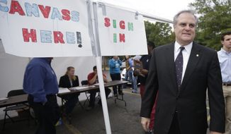 U.S. Sen. Mark Pryor, D-Ark., arrives at a rally for campaign volunteers Saturday, Sept. 13, 2014, in Little Rock, Ark. Pryor will face Republican challenger U.S. Rep. Tom Cotton in the November election. (AP Photo/Danny Johnston)