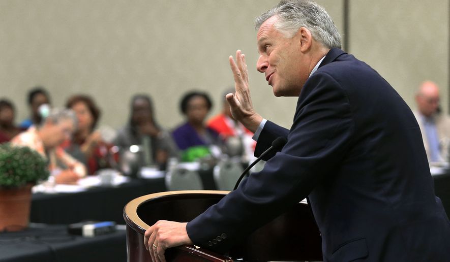 Virginia Gov. Terry McAuliffe speaks to members of the Virginia Governmental Employees Association at the Double Tree by Hilton Hotel in Chesterfield, Va. Sept. 13, 2014. Gov. McAuliffe reassured the employees that, in spite of state budget cuts, he pledges to support them. "I'm working hard for you," he told them. He called state employees "the best" and challenged them to be creative and innovative. (AP Photo/Richmond Times-Dispatch, P. Kevin Morley)