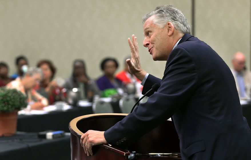 Virginia Gov. Terry McAuliffe speaks to members of the Virginia Governmental Employees Association at the Double Tree by Hilton Hotel in Chesterfield, Va. Sept. 13, 2014. Gov. McAuliffe reassured the employees that, in spite of state budget cuts, he pledges to support them. "I'm working hard for you," he told them. He called state employees "the best" and challenged them to be creative and innovative. (AP Photo/Richmond Times-Dispatch, P. Kevin Morley)