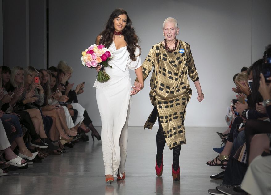 Designer Vivienne Westwood, alongside her granddaughter Cora Corre, during her Spring/Summer 2015 collection during London Fashion Week, at Victoria House in central London, Sunday, Sept. 14, 2014. (Photo by Joel Ryan/Invision/AP)