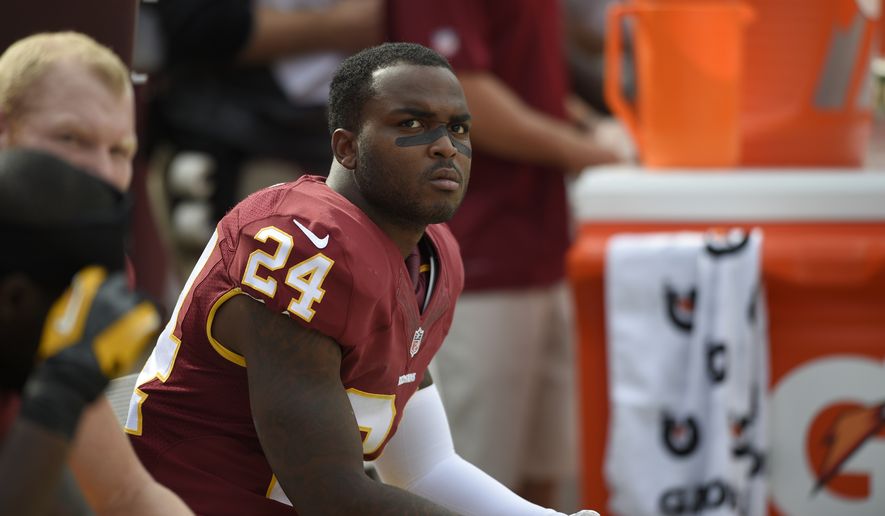 Washington Redskins strong safety Bacarri Rambo (24) looks on from the bench during the second half of an NFL football game against the Jacksonville Jaguars, Sunday, Sept. 14, 2014, in Landover, Md. The Redskins won 41-10. (AP Photo/Nick Wass)