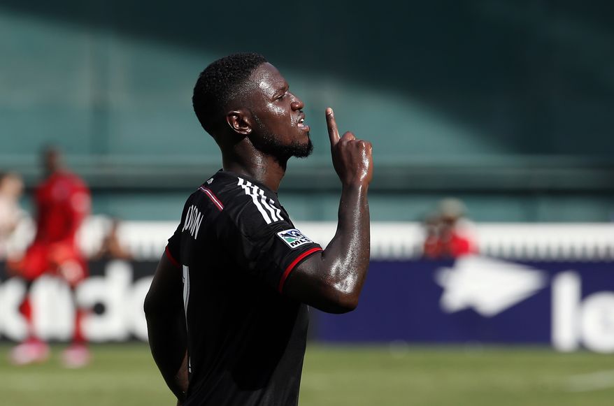 **FILE** D.C. United forward Eddie Johnson (7) celebrates after his goal during the second half of an MLS soccer match against the New York Red Bulls on Sunday, Aug. 31, 2014, in Washington. United won 2-0. (AP Photo/Alex Brandon)