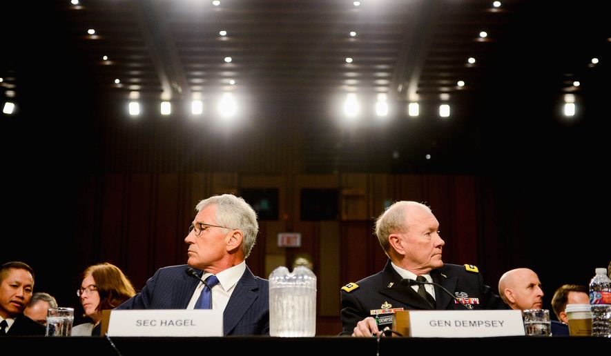 architects: Secretary of Defense Chuck Hagel and the Chairman of the Joint Chiefs of Staff Gen. Martin E. Dempsey remain in the process of continuing to shape Obama administration activities to rout the Islamic State terrorist group. (Andrew Harnik/The Washington Times)