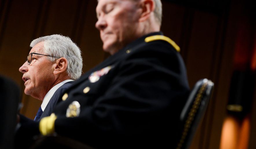 Secretary of Defense Chuck Hagel, left, and the Chairman of the Joint Chiefs of Staff Martin Dempsey testify concerning the Islamic State of Iraq and the Levant (ISIL) in front of the Senate Armed Services Committee on Capitol Hill, Washington, D.C., Tuesday, September 16, 2014. (Andrew Harnik/The Washington Times)