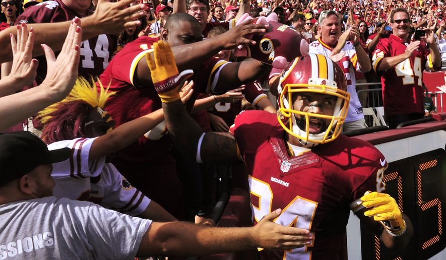 Washington Redskins tight end Niles Paul (84)  celebrates with the fans after his second touchdown reception of the day against the Jacksonville Jaguars at FedEx Field, Sept. 14, 2014. (Preston Keres/Special for The Washington Times)