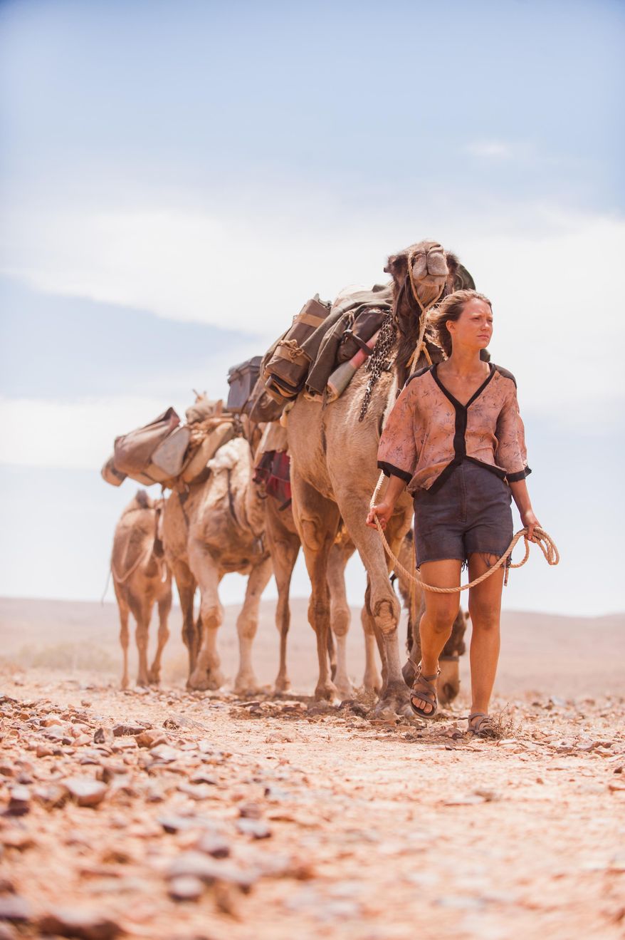 In this image released by The Weinstein Company, Mia Wasikowska appears in a scene from "Tracks." (AP Photo/The Weinstein Company, Matt Nettheim)