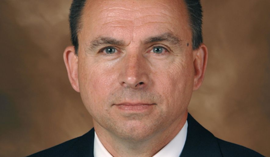 FILE - In this 2010 file photo provided by the Iowa Department of Public Saftey is Larry Hedlund. Hedlund, a veteran Iowa criminal investigator, was fired in 2013 after reporting Gov. Terry Branstad's speeding SUV on a state highway. (AP Photo/Iowa Department of Public Saftey, File)