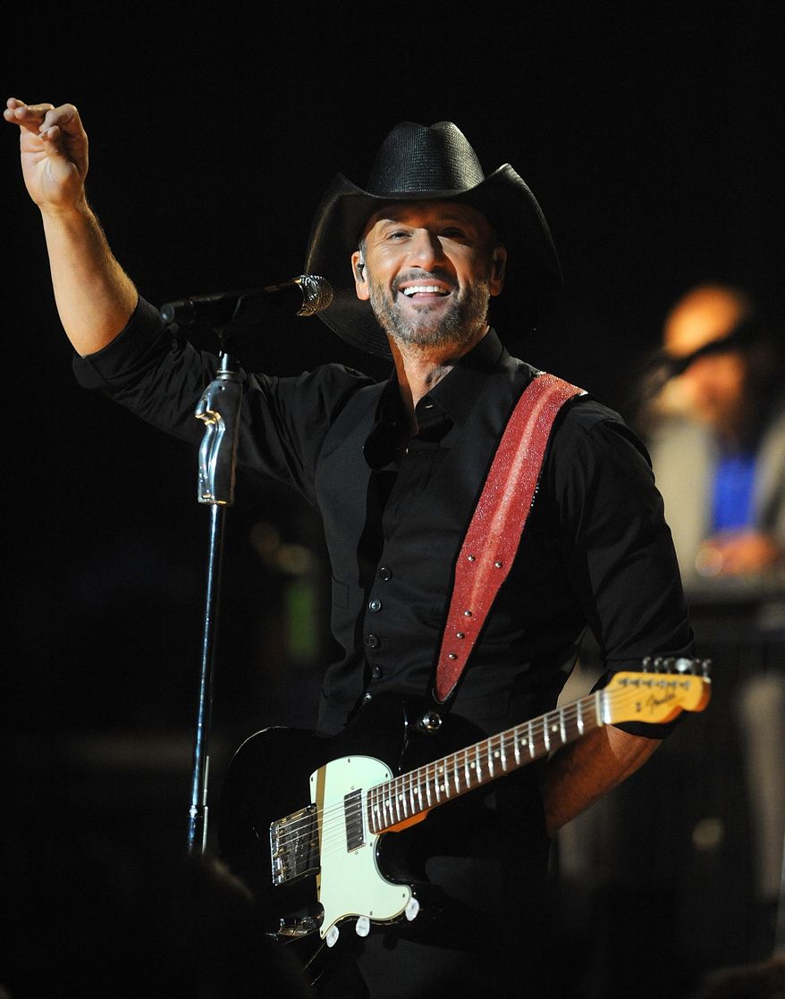 Country singer Tim McGraw performs on stage at the Hammerstein Ballroom on Tuesday, Sept. 16, 2014, in New York. (Photo by Brad Barket/Invision/AP)