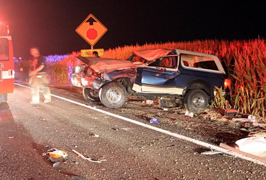 This Sept. 14, 2014 photo provided by the Ada County, Idaho, Sheriff's Office shows a Ford Bronco after it crashed with five teenagers aboard, after authorities say one of the passengers lit the driver’s armpit hair on fire with a lighter in rural Ada County outside of Bosie. All five were hurt in the crash Sunday and had to receive medical treatment. (AP Photo/Ada County Sheriff’s Office)