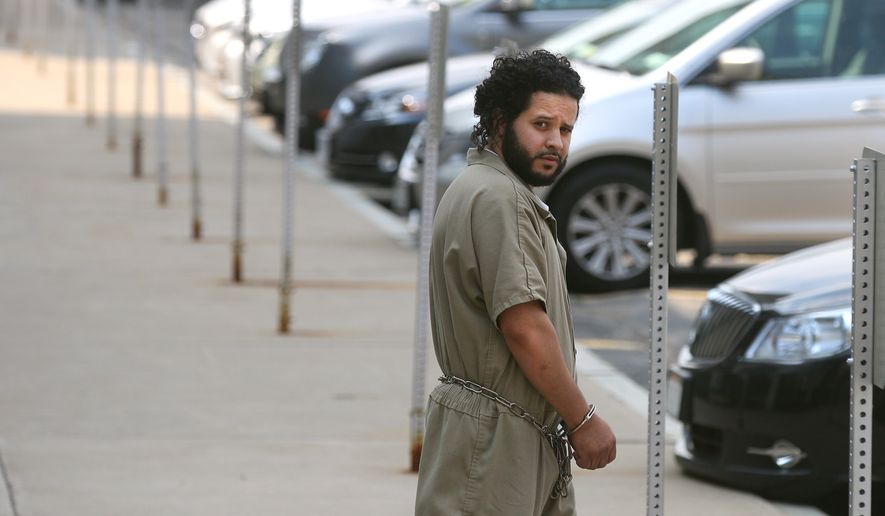 Mufid Elfgeeh is taken from his arraignment in federal court  in Rochester, NY, Monday June 2, 2014.  The Rochester man was indicted Tuesday Sept. 16, 2014 on charges that he tried to provide material support to the Islamic State by helping three men who said they would travel to Syria to &amp;#8220;engage in violent jihad&amp;#8221; alongside the group&amp;#8217;s militants, according to the Justice Department.  (AP Photo/Democrat &amp; Chronicle, Shawn Dowd)