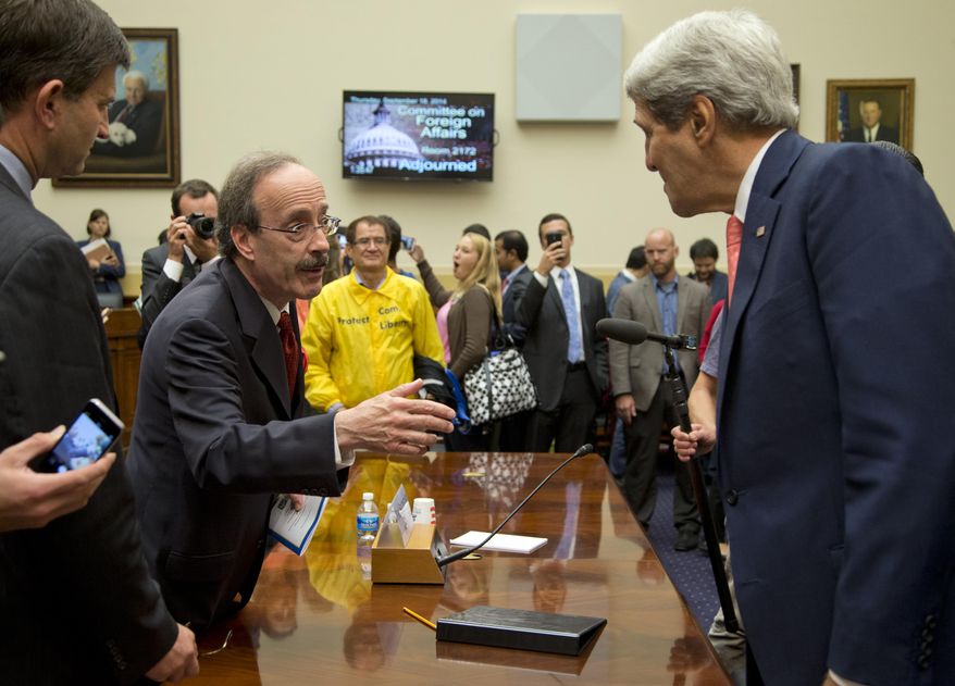 Secretary of State John Kerry, right, speaks with House Foreign Affairs Committee ranking member Rep. Eliot Engel, D-N.Y., on Capitol Hill in Washington, Thursday, Sept. 18, 2014, after a House Foreign Affairs Committee hearing. At the hearing, Kerry sought to push back on an argument by some in Congress that Syria's rebels lack moderates, or at least any with the capacity to make a difference in the war. (AP Photo/Carolyn Kaster)
