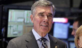 FILE - U.S. Customs and Border Protection Commissioner R. Gil Kerlikowske poses for photos after ringing the New York Stock Exchange closing bell, Tuesday, Aug. 5, 2014 file photo. Kerlikowske scheduled a news conference Thursday Sept. 18, 2014 in Washington to discuss what his office said were &amp;#8220;developments toward CBP&amp;#8217;s commitment to increase transparency and accountability.&amp;#8221; (AP Photo/Richard Drew, File)
