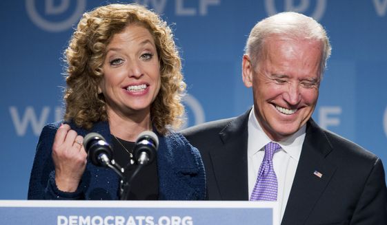 Vice President Joe Biden, right, laughs as he is introduced by DNC Chair Rep. Debbie Wasserman Schultz, D-Fla., at the DNC Women&#39;s Leadership conference in Washington, Friday, Sept. 19, 2014. (AP Photo/Manuel Balce Ceneta) ** FILE **
