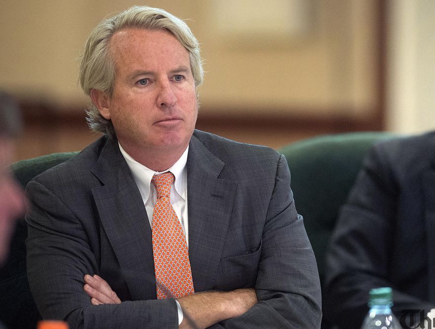 FILE - In this Sept. 11, 2014 file photo, University of Illinois Board of Trustees Chairman Chris Kennedy Jr., listens to discussion during a trustees meeting in Urbana, Ill. In an interview published in The News-Gazette on Friday, Sept. 19, 2014, Kennedy said the university was right to deny a faculty job to professor Steven Salaita whose anti-Israel Twitter messages were considered by some to be anti-Semitic. Salaita accepted an offer starting this fall to be a Native American Studies professor but was told he would not be hired after he later posted profanity-laced Twitter messages during Israel's war with Gaza in July. The Board of Trustees last week declined to change that decision. (AP Photos/News-Gazette/Rick Danzl, File) MANDATORY CREDIT
