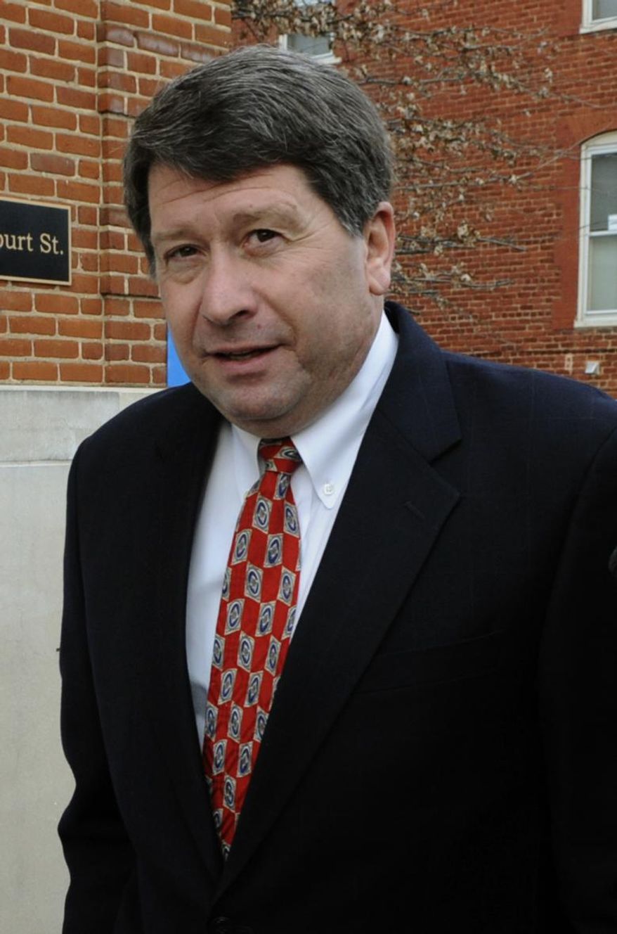 FILE - In this March 12, 2009 file photo, Peanut Corporation of America's president Stewart Parnell arrives a federal court in Lynchburg, Va. A federal jury in Albany, Ga., convicted Parnell and two others Friday, Sept. 19, 2014, in connection with a salmonella outbreak that prompted one of the largest U.S. food recalls ever, sickened hundreds across the country and was linked to several deaths. Parnell was convicted on numerous counts including conspiracy, wire fraud and obstruction of justice related to shipping tainted peanut butter to customers and faking results of lab tests intended to screen for salmonella. (AP Photo/Don Petersen, File)