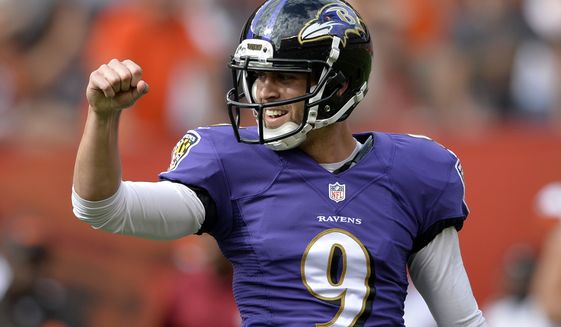 Baltimore Ravens kicker Justin Tucker celebrates his game-winning field goal as time expires in a 23-21 win over the Cleveland Browns in an NFL football game Sunday, Sept. 21, 2014, in Cleveland. (AP Photo/David Richard)