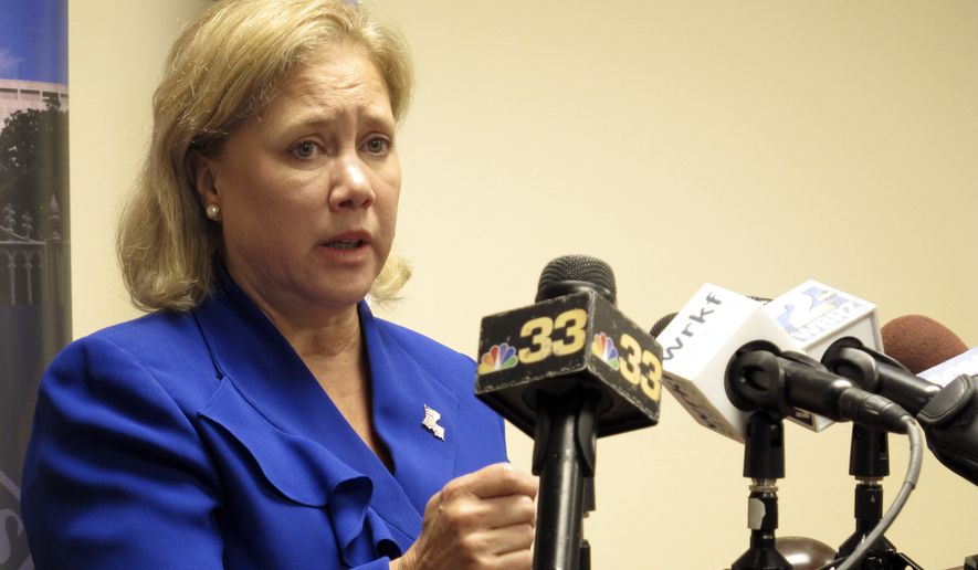 U.S. Sen. Mary Landrieu, a Democrat, talks to reporters after signing her qualifying paperwork to run for re-election in Baton Rouge, La., in this Aug. 20, 2014, file photo. Landrieu is seeking a fourth term. (AP Photo/Melinda Deslatte) ** FILE **