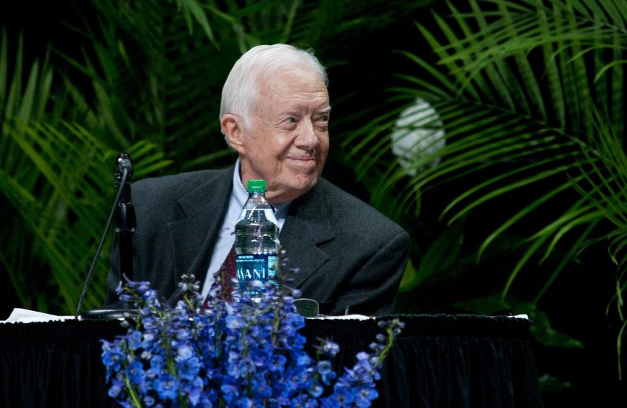Former President Jimmy Carter speaks at Grand Rapids Community College&#39;s Ford Fieldhouse as part of the Diversity Lecture Series, Monday, Sept. 22, 2014. GRCC is celebrating its 100th anniversary. (AP Photo/The Grand Rapids Press, Cory Morse)