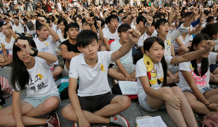 Thousands of Hong Kong students boycotted classes Monday to protest Beijing&#x27;s decision to restrict electoral reforms. The protesters plan a weeklong strike, marking the latest phase in the battle for democracy in the Chinese city-state. (Associated Press)