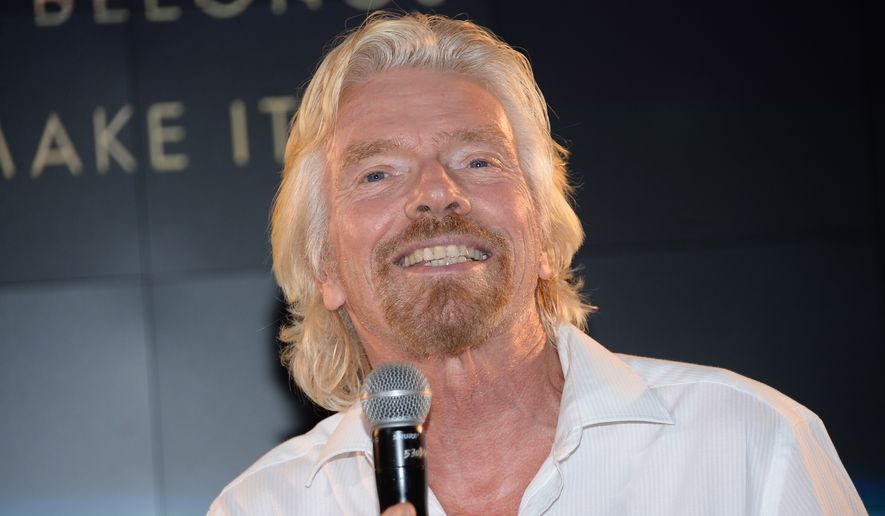Virgin Group founder Richard Branson speaks at the Grey Goose Vodka and Virgin Galactic global partnership announcement event at the Rose Center for Earth & Space on Monday, Sept. 22, 2014, in New York. (Photo by Evan Agostini/Invision/AP) ** FILE **