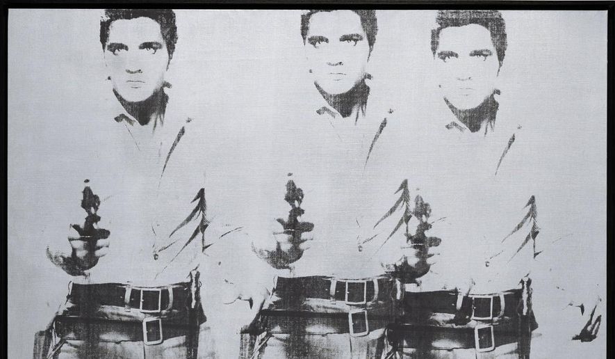 This undated photo provided by Christie&#x27;s shows Andy Warhol&#x27;s &amp;quot;Triple Elvis (Ferus Type),&amp;quot; which is going on the auction block at Christie&#x27;s in New York this November. The Elvis, executed in ink and silver paint in 1963, depicts the rock &#x27;n&#x27; roll heartthrob as a cowboy, armed and shooting from the hip. (AP Photo/Christie&#x27;s)