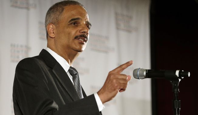 U.S. Attorney General Eric Holder delivers a keynote speech at New York University&#x27;s law school, Tuesday, Sept. 23, 2014, in New York. According to Holder, the Justice Department expects to end the current budget year next week with a federal prison population of roughly 215,000 inmates. The prison population has dropped in the last year by roughly 4,800, the first time in several decades that the inmate count has gone down, according to the Justice Department.  (AP Photo/Julio Cortez)